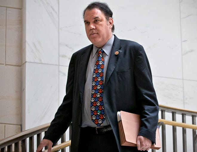 In this Sept. 5, 2013 file photo, Rep. Alan Grayson, D-Fla., arrives to join lawmakers and national security officials at the Capitol in Washington.