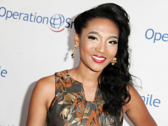 FILE - In this Sept. 19, 2014 file photo, singer Judith Hill arrives at Operation Smile's 2014 Smile Gala in Beverly Hills, Calif. Hill is set to open for Prince during his pop-up tour nationwide.