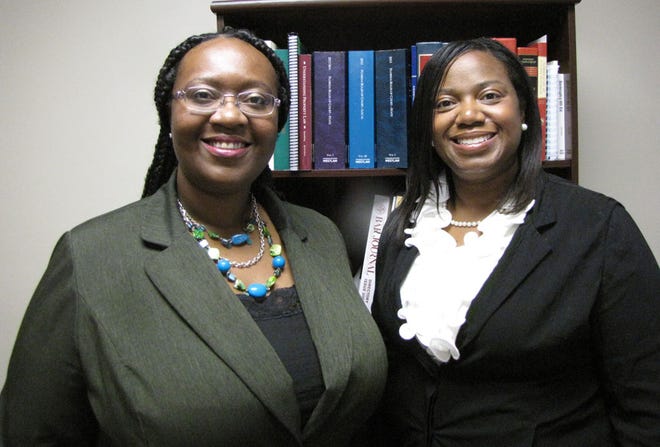 Summer Griggs, left, and Najah Adams, partners in the Gainesville law firm, Adams & Griggs, P.A.