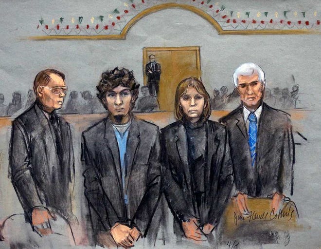 In this courtroom sketch, Dzhokhar Tsarnaev, second from left, is depicted standing with his defense attorneys William Fick, left, Judy Clarke, second from right, and David Bruck, right, as the jury presents its verdict in his federal death penalty trial Wednesday, April 8, 2015, in Boston. Tsarnaev was convicted on multiple charges in the 2013 Boston Marathon bombing. Three people were killed and more than 260 were injured when twin pressure-cooker bombs exploded near the finish line. (AP Photo/Jane Flavell Collins)