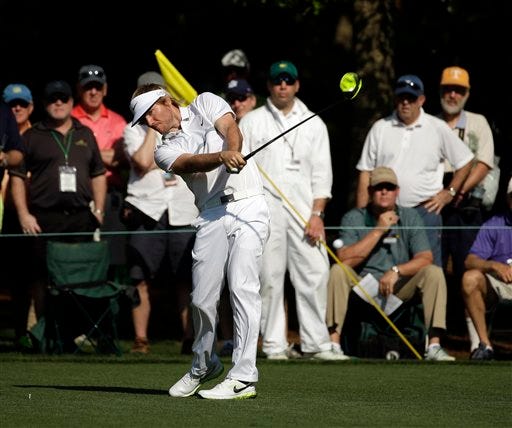 Russell Henley tees off on the seventh hole during the first round of the Masters golf tournament Thursday, April 9, 2015, in Augusta, Ga. (AP Photo/Matt Slocum)