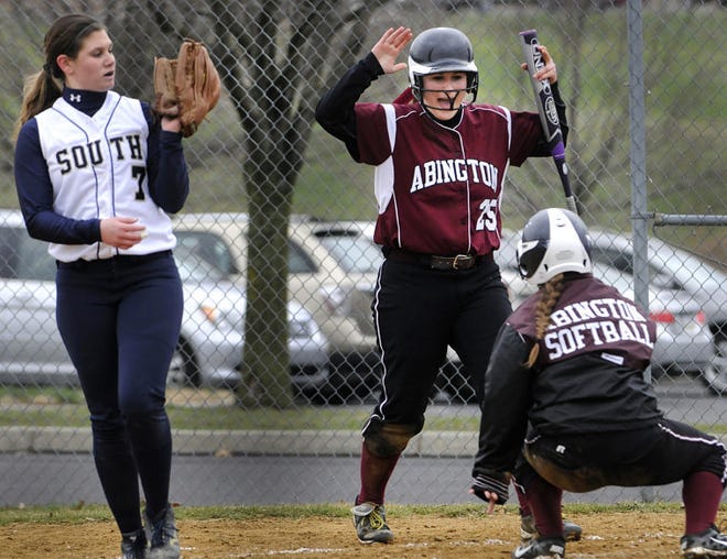 Abington's Maddie Malfara (#25) cheers as Jess Paley scores a run against CR South and pitcher, Amanda Sharp in a big win over South on Thursday, April 9. 2015.