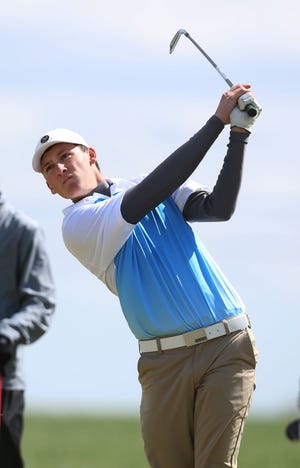 Hutchinson's Jack Lanham tees off on hole 14 at Turkey Creek Golf Course Thursday, April 9, 2015 in McPherson.