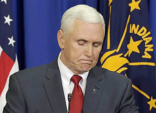 Indiana Gov. Mike Pence listens to a question during a news conference, Tuesday, March 31, 2015, in Indianapolis. (AP Photo/Darron Cummings)