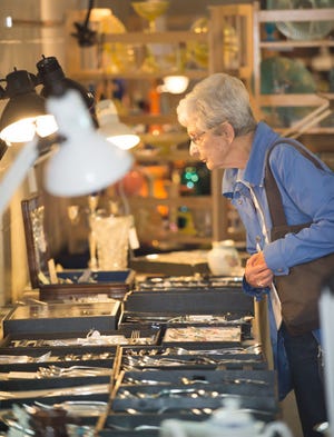 Glenna Stewart of Moorestown looks over jewelry at a previous show.