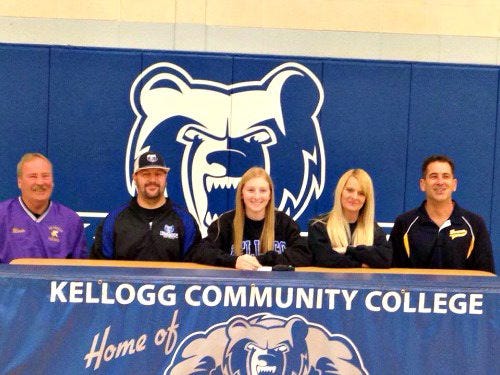 Kinslea Blouin signs her letter of intent to play softball with KCC next season.



COURTESY PHOTO