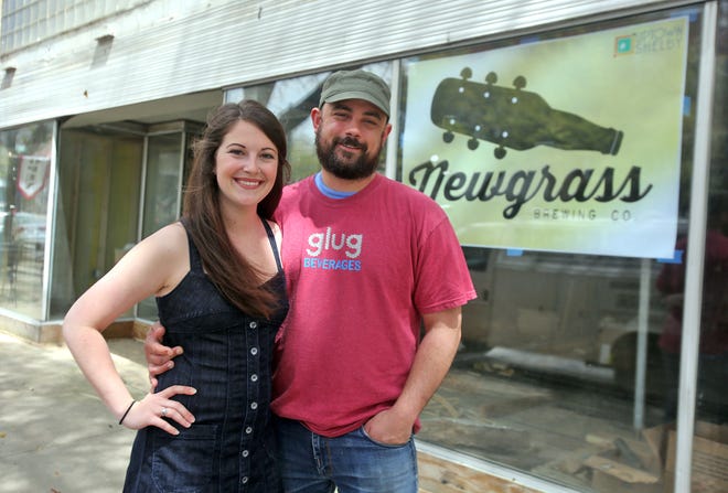 Newgrass Brewery owners Jordan Boinest and Lewis McCallister are shown in front of the future home of their uptown Shelby brewery, currently under construction. The Newgrass owners are hoping to put Shelby on the growing North Carolina craft beer map.