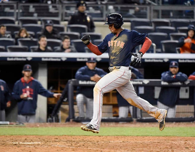 Xander Bogaerts scores in the 19th inning to give Boston a 6-5 win over the New York Yankees in a game which ended at 2:13 a.m. Saturday. Boston also won later Saturday.