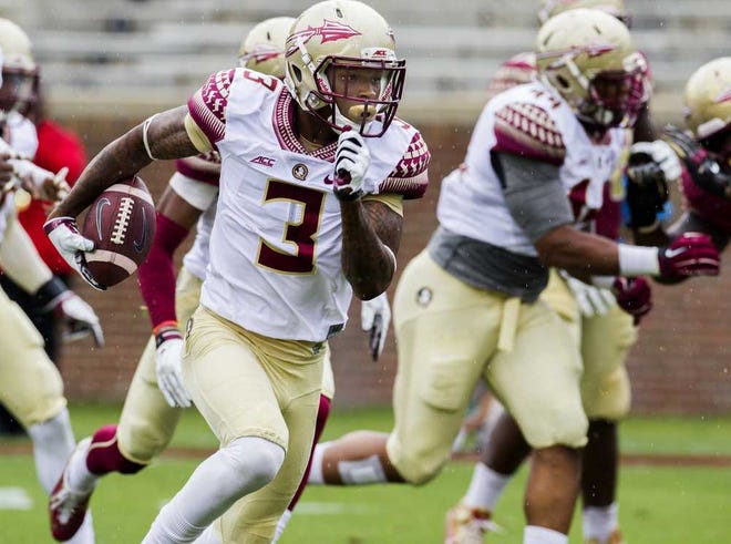 Mark Wallheiser Associated Press Florida State defensive back Jesus Wilson returns an interception for a touchdown in the first half of Florida State Garnet & Gold spring game in Tallahassee on Saturday. C-6