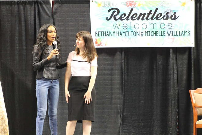 From left, Grammy award-winning singer and songwriter Michelle Williams, of Destiny's Child, speaks on stage with Jill Brenneis on Saturday at the Relentless Conference at United Supermarkets Arena in Lubbock. Brenneis is executive director of Relentless, the organization that hosted Williams and surfer Bethany Hamilton.