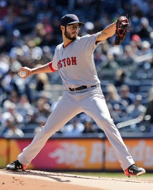 Boston Red Sox's Joe Kelly delivers a pitch during the first inning of a baseball game against the New York Yankees Saturday, April 11, 2015, in New York. (AP Photo/Frank Franklin II)