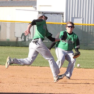 Dwight shortstop Chris Peck reaches for the ball but misses during Friday’s baseball game.