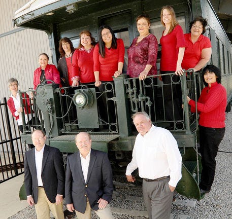 Members of the Porter Insurance staff today are, from left to right, top, Jeana Fulfer, Kathy Day, Amy Hamrick, Nancy Lackey, Mayra Mares, Brenda Hicks, Stephanie Blackburn, Betty Knight and Elva Cantu; and bottom, Richard Porter, Robert Porter and Warren Blesh.