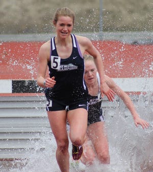 Pike/Seacoast Sunday photo

UNH's Samantha Blais splashes through the water hazard followed by teammate Julia Shorter during the women's steeplechase at Saturday's meet in Durham.