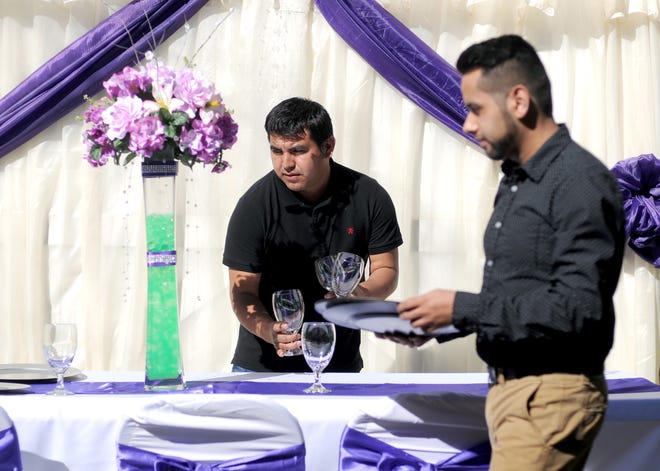 Business partners Domingo Marquez (left) and Pedro Gonzalez launched Innova Events, which specializes in planning quinceañeras and other events in the local Hispanic community.