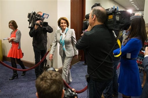 House Minority Leader Nancy Pelosi of Calif. arrives on Capitol Hill in Washington, Tuesday, April 14, 2015, for a House Democratic Caucus meeting to discuss the Iran nuclear deal with Secretary of State John Kerry. Kerry, who played a leading role in getting a framework agreement with Iran last month, personally pleaded with House Republicans and Democrats on Monday to give the Obama administration more time and room to negotiate a final deal. Kerry met in a closed-door session with members of the House and was to meet with senators on Tuesday before the committee debates the bill. (AP Photo/Andrew Harnik)