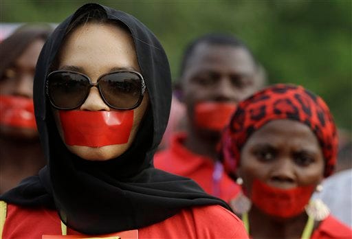 FADING HOPES TO FIND NIGERIA GILRS: Activists are marking the anniversary of the mass abduction that outraged the world with a change in their slogan from "Bring Back Our Girls — Now and Alive" to "Never to be Forgotten."