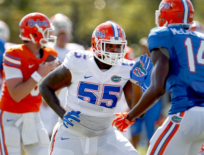 Florida offensive lineman Roderick Johnson's (55) playing career is over because of injury.