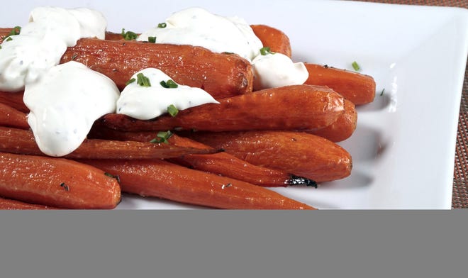 Roasted carrots with rosemary butter and black pepper crème fraîche from Connie and Ted's, in West Hollywood, Calif. 

Los Angeles Times/Glenn Koenig