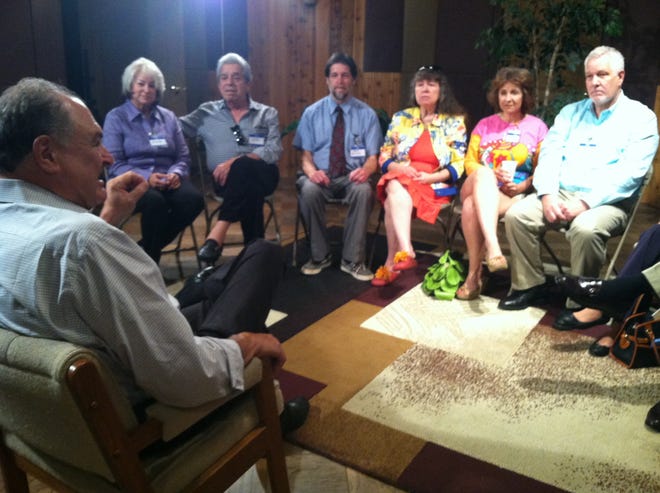 Sam Sugar of Aventura, left, moderates a panel discussion on adult guardianship at a Longwood video production studio Wednesday, April 15, 2015. The panelists, from left, are Irela and Pepe Castillo of Miami, Lawrence and Beverly Newman and Julie Ferguson of Sarasota, and Doug Franks of Stone Mountain, Georgia.