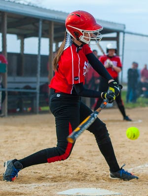 United High School sophomore Maddie Ballard swings at a pitch Tuesday against Mercer County High School in Aledo. Ballard and the Red Storm are looking to win a conference title for the first time since 2011. CHRIS ZOELLER / WCI Sports