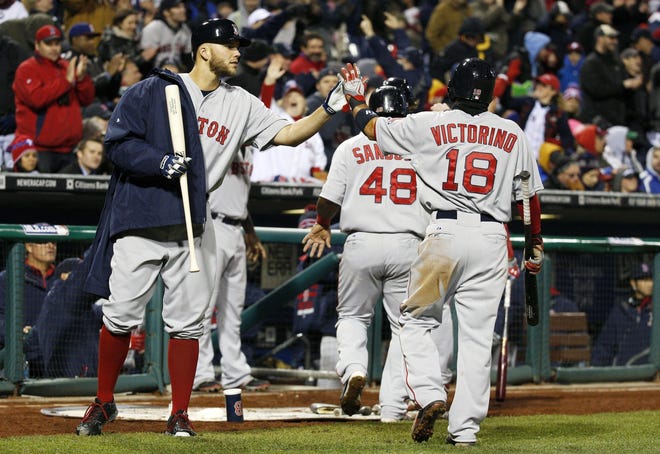 Coming off back surgery, Shane Victorino, right, is just happy to be back playing the game and not yelling at his TV. His wife is also happy to have him back at the ballpark. Chris Szagola/THE ASSOCIATED PRESS