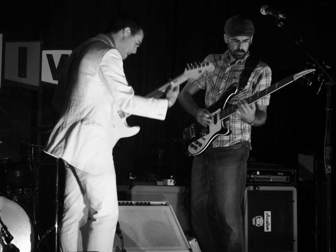 The Shoddy Beatles, with Travis Atria on guitar, left, and Eric Atria on bass, will perform April 17-18 at High Dive.