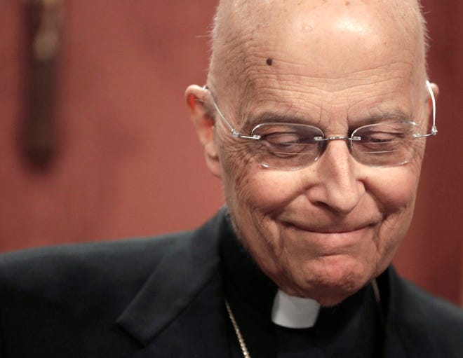 In this April 11, 2013 file photo, Chicago Cardinal Francis George pauses while speaking at a news conference in Chicago. George, a vigorous defender of Roman Catholic orthodoxy who led the U.S. bishops' fight against Obamacare and played a key role in the church's response to the clergy sex abuse scandal, has died. He was 78. (AP Photo/M. Spencer Green, File)