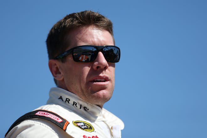 Carl Edwards is looking for a win at Richmond behind those dark sunglasses.