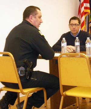 Frankfort Police Chief Ronald Petrie, left, who also serves as officer in charge for the Town of Frankfort Police Department, addresses a joint meeting of the town and village board. Also shown is Village Trustee James Caiola. TIMES PHOTO/DONNA THOMPSON