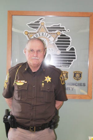 Branch County Sheriff John Pollock spoke on what his officers do when responding to a domestic violence call. Spencer Lahr Photo