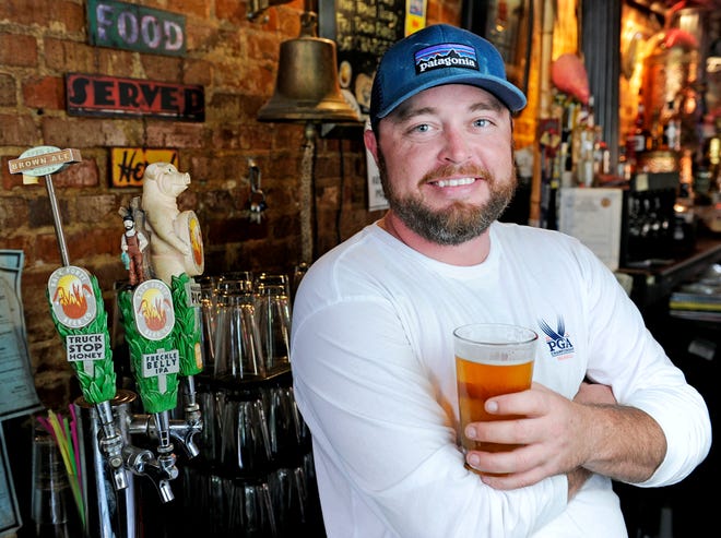 FILE - Jason Wilson, President of Back Forty Beer Company, is pictured at Blackstone Pub and Eatery in Gadsden, Ala. on August 14, 2014.