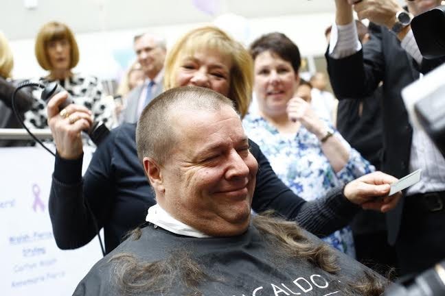 Quincy Mayor Thomas Koch after a buzz cut for charity on Tuesday, April 7.