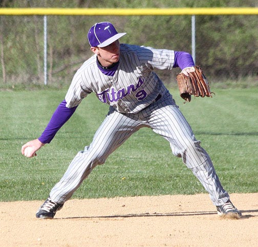 El Paso-Gridley second baseman John Meinhold makes a throw to first base for a putout during the Titans’ come-from-behind Heart of Illinois Conference victory over Lexington Wednesday afternoon.