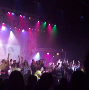 In this image from video provided by Zach Rader students from Westfield High School are on the stage during the grand finale of the concert dubbed "American Pie" Thursday April 23, 2015 just prior to the stage collapsed. More than a dozen students were injured after the stage filled with students collapsed during the musical performance at the central Indiana high school Thursday night, authorities said. (Zach Rader via AP)