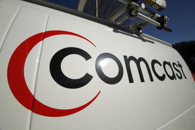 This Feb. 11, 2011 file photo shows the Comcast logo on one of the company’s vehicles, in Pittsburgh. Wall Street appears increasingly convinced Comcastís $45.2 billion purchase of Time Warner Cable is dead. telling indicator is the gap between the value Comcastís all-stock bid assigned to each Time Warner Cable share and Time Warner Cable stockís current price. That was at its widest point yet Thursday, April 23, 2015, a signal that investors are giving just 20 to 30 percent odds that the deal will go through, said Nomura analyst Adam Ilkowitz.