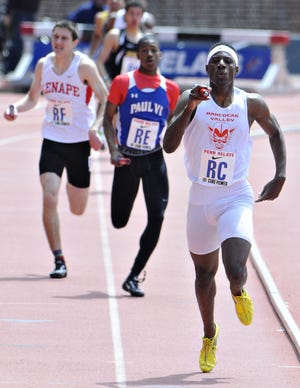 Rancocas Valley's Sterling Pierce crosses the finish line in first place Boys' 4x400 South Jersey Large Saturday, April 25, 2015 during the Penn Relays at the University of Pennsylvania in Philadelphia. With first place in hand, Rancocas Valley had a time of 3:24.39.