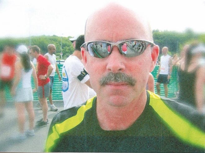 This year's Abington Police Community Partners Road Race will benefit melanoma research in memory of late Abington native Dan Farquharson, pictured here, who died of the disease last year.
