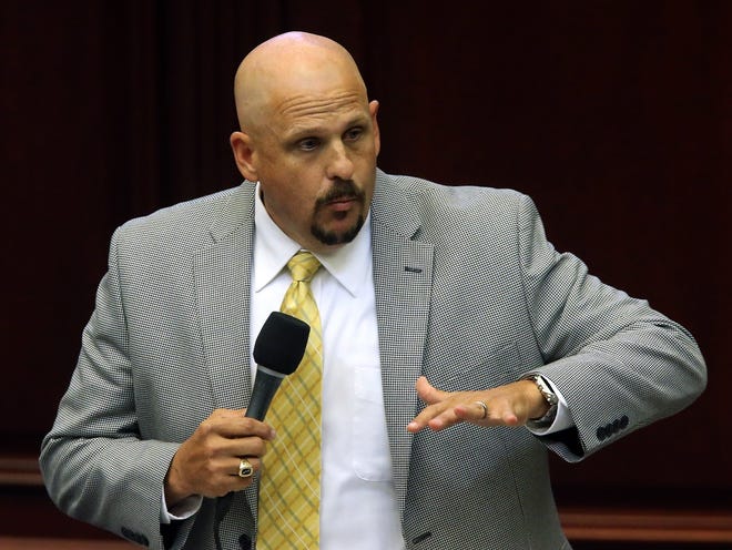 Rep. Ritch Workman, R-Melbourne, speaks in support of an alimony bill during session, Friday, April 24, 2015, in Tallahassee, Fla.