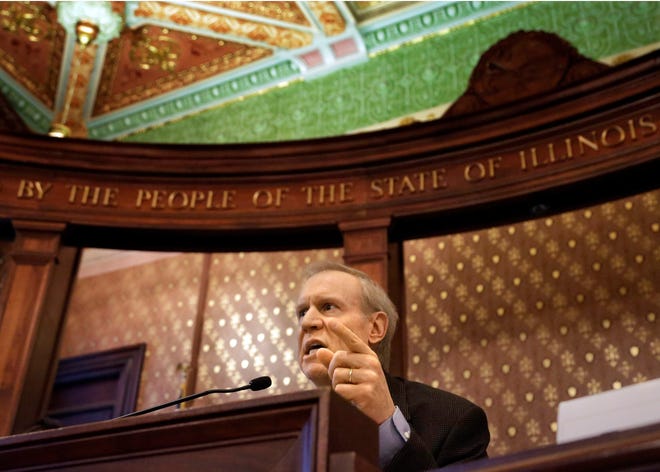 Gov. Bruce Rauner speaks to cabinet members during a meeting at the state Capitol, Wednesday, Feb. 25, 2015, in Springfield. (AP Photo/File)
