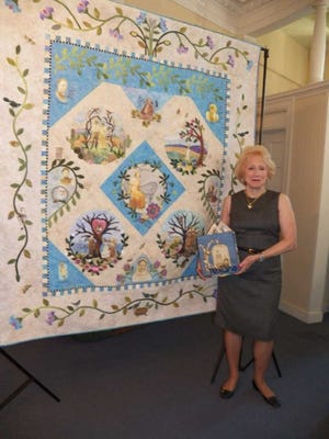 During her "Tale of Two Quilts" presentation, Pat Styring explained how genealogy and quilting can be combined to form an artistic quilt about family history.