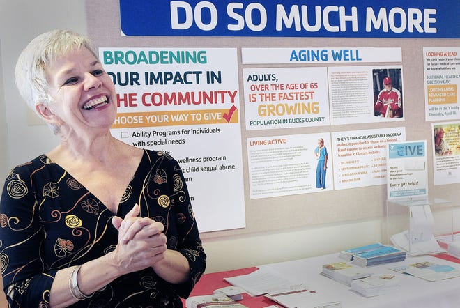 Betsy Payn, founder of Looking Ahead Advance Care Planning, reaches out to YMCA members about her nonprofit, which helps families have a conversation about end-of-life care on Thursday April 16, 2015 in Doylestown. Payn, a former hospice nurse, started the organization a year ago along with Dr. Veronica Coyne, former medical director of Doylestown Hospital Hospice. Together, they help families talk about, and plan medically, for the inevitable.