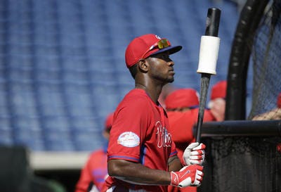 Philadelphia Phillies left fielder Domonic Brown waits to bat during batting practice before a spring training baseball exhibition game against the New York Yankees, Tuesday, March 3, 2015, in Clearwater, Fla. (AP Photo/Lynne Sladky)