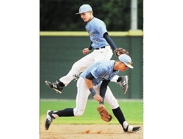 Bartlesville High School infielders Logan McNeill, No. 6, and A.J. Archambo appear to avoid a troubling encounter during Monday’s varsity baseball showdown against Enid, at Bill Doenges Memorial Stadium. Enid won, 4-1. Becky Burch/Examiner-Enterprise