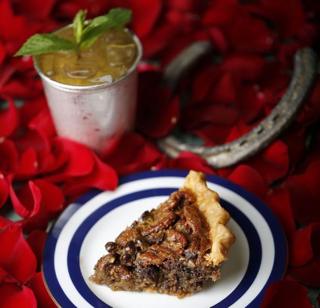 Chocolate-Bourbon Pecan Pie, a version of the patented Derby Pie, with a mint julep.