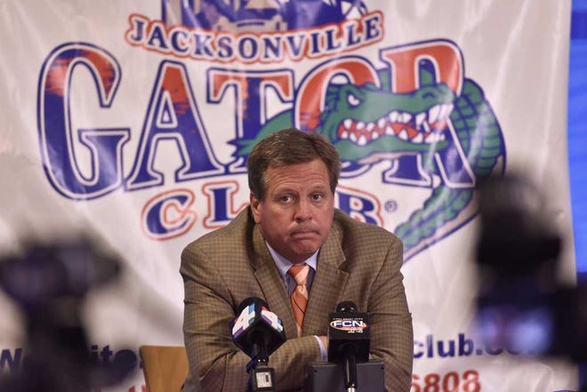 Will.Dickey@jacksonville.com Florida football coach Jim McElwain speaks to the media at a Jacksonville Gator Club function on Tuesday at the Schultz Center. McElwain says fans are asking a lot of questions about the offensive line.