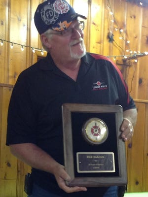 Fire Chief Rick Anderson was recognized at a community event April 19 for 26 years of service with the London Mills Department. SUBMITTED PHOTO