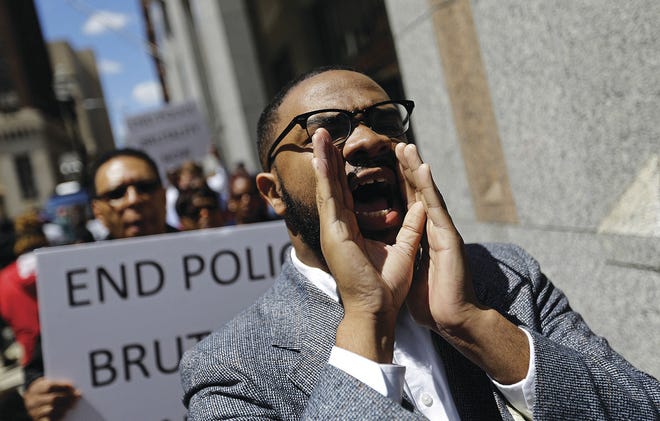 David Goldman/Associated Press Melech Thomas chants Wednesday during a demonstration outside the State Attorney's office calling for the continued investigation into the death of Freddie Gray in Baltimore. People in Baltimore have been angry over the police-custody death of Gray. They have marched in the streets for more than a week, and riots unfolded Monday, the day of Gray's funeral.