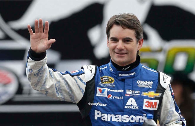 FILE - In this April 11, 2015, file photo, Sprint Cup Series driver Jeff Gordon waves during introductions before a NASCAR auto race at Texas Motor Speedway in Fort Worth, Texas. Jeff Gordon will drive the pace car for the Indianapolis 500 next month. He'll take the field to the green flag in the May 24 race, watch some laps with his wife and children, then fly to North Carolina to compete in NASCAR's Coca-Cola 600 that evening. Chevrolet made the announcement Wednesday, April 29, 2015, at Indianapolis Motor Speedway (AP Photo/Ralph Lauer, File)