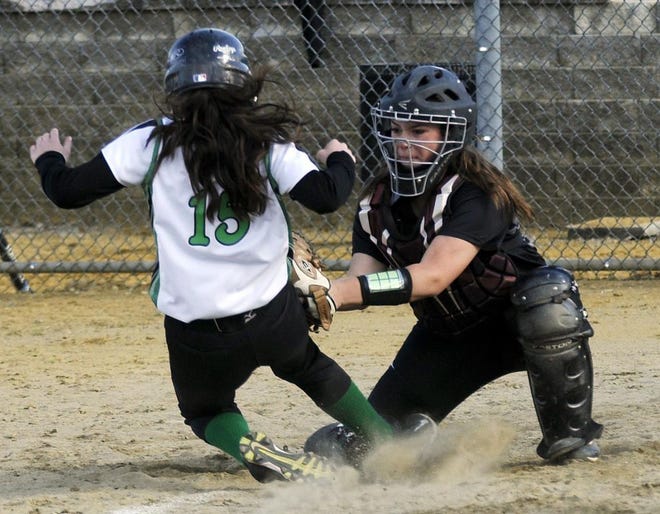 Notre Dame's Giana Vecchio is tagged out at home by Holy Name catcher Deanna DiPilato.